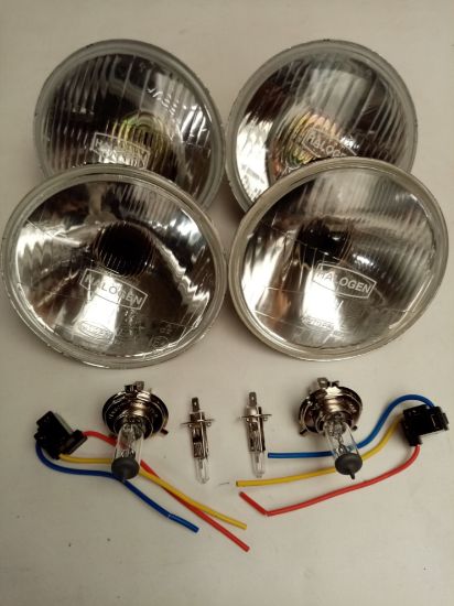 Picture of HALOGEN HEADLAMP SET 5 3/4 WITH HALOGEN LOGO INC BULBS/H4 PLUGS RIGHT HAND DRIVE STAG/VIT/2000/SPRINT/1850/1500HL((JPS579)